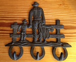 Cast Iron Horse Cowboys Father & Son by Fence